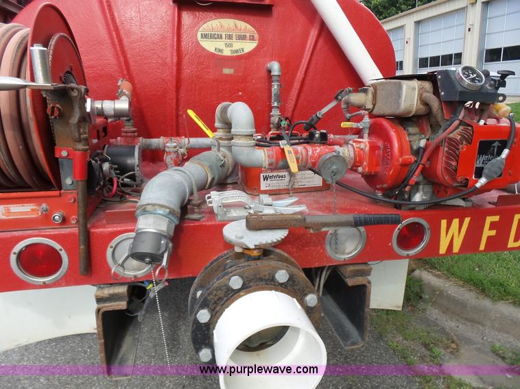 image for item K3178 1997 International 4700 Crew Cab tanker fire truck