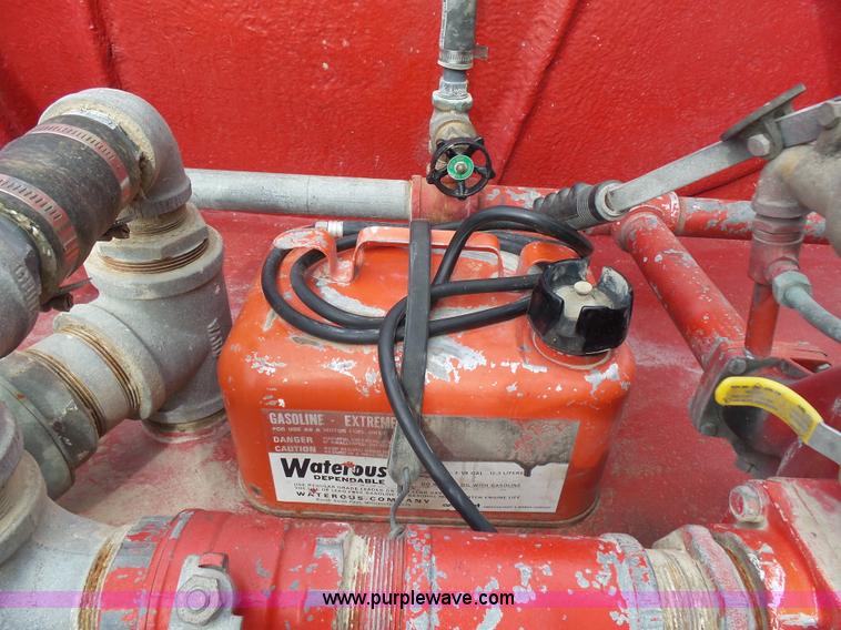 image for item K3178 1997 International 4700 Crew Cab tanker fire truck