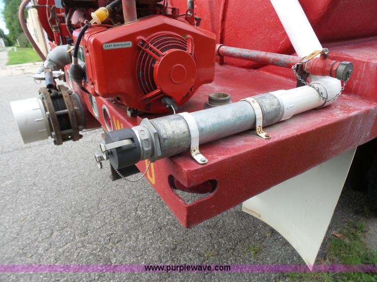 image for item K3178 1997 International 4700 Crew Cab tanker fire truck