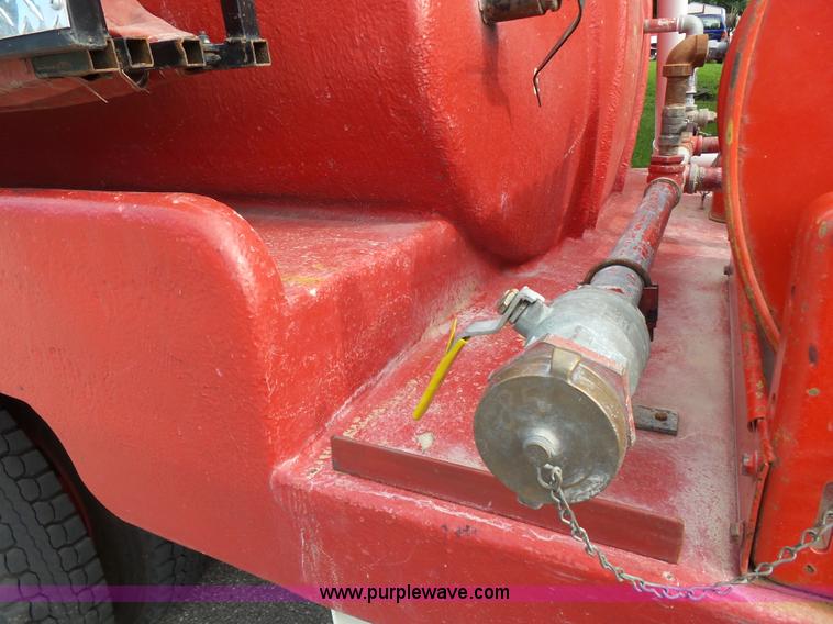 image for item K3178 1997 International 4700 Crew Cab tanker fire truck