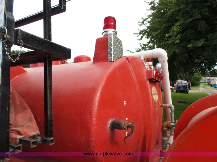 image for item K3178 1997 International 4700 Crew Cab tanker fire truck