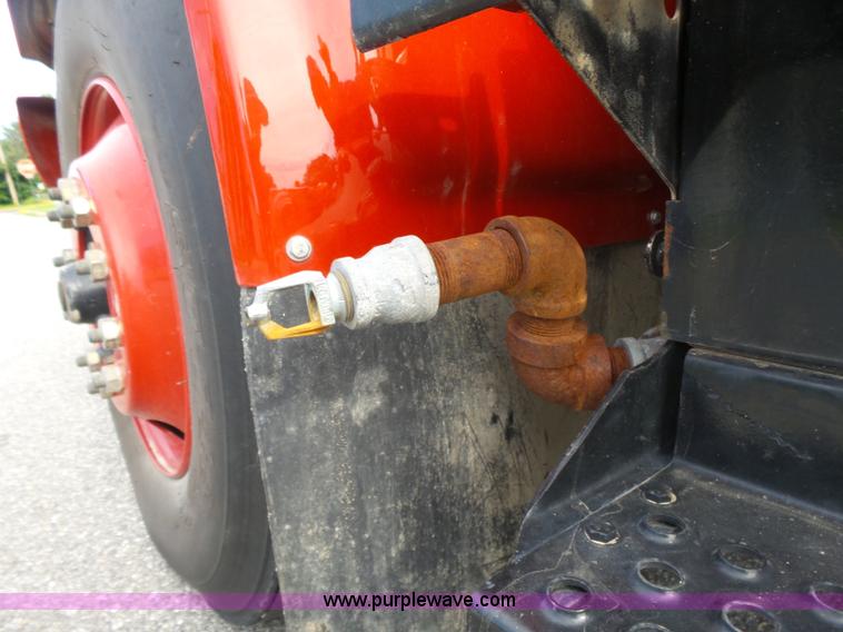 image for item K3178 1997 International 4700 Crew Cab tanker fire truck