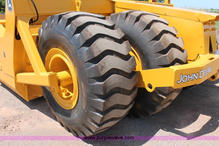 image for item K8795 2013 John Deere 2112E scraper