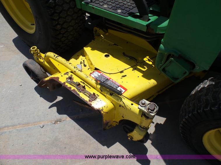 image for item K8772 1998 John Deere 4100 MFWD tractor