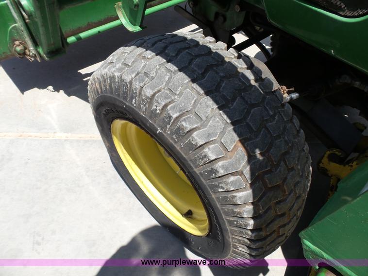 image for item K8772 1998 John Deere 4100 MFWD tractor