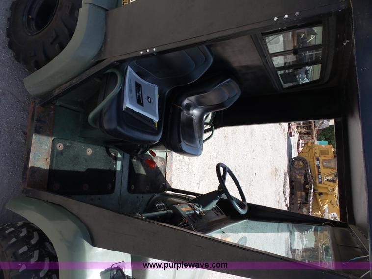 image for item L2888 John Deere Trail Gator utility vehicle