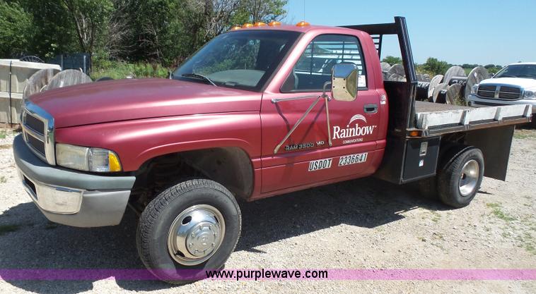 image for item L4838 1999 Dodge Ram 3500 flatbed pickup truck