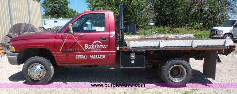 image for item L4838 1999 Dodge Ram 3500 flatbed pickup truck