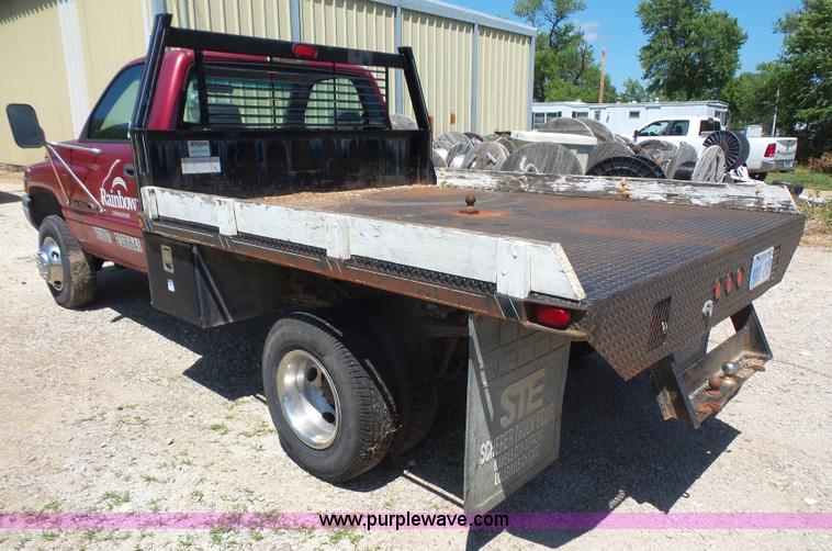 image for item L4838 1999 Dodge Ram 3500 flatbed pickup truck