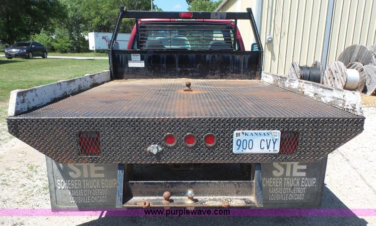image for item L4838 1999 Dodge Ram 3500 flatbed pickup truck