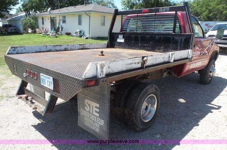 image for item L4838 1999 Dodge Ram 3500 flatbed pickup truck