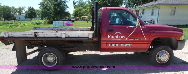image for item L4838 1999 Dodge Ram 3500 flatbed pickup truck