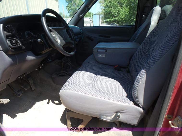 image for item L4838 1999 Dodge Ram 3500 flatbed pickup truck