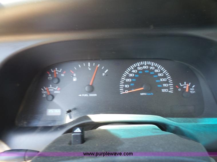 image for item L4838 1999 Dodge Ram 3500 flatbed pickup truck