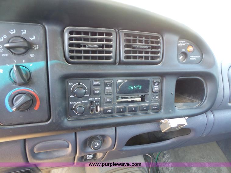 image for item L4838 1999 Dodge Ram 3500 flatbed pickup truck