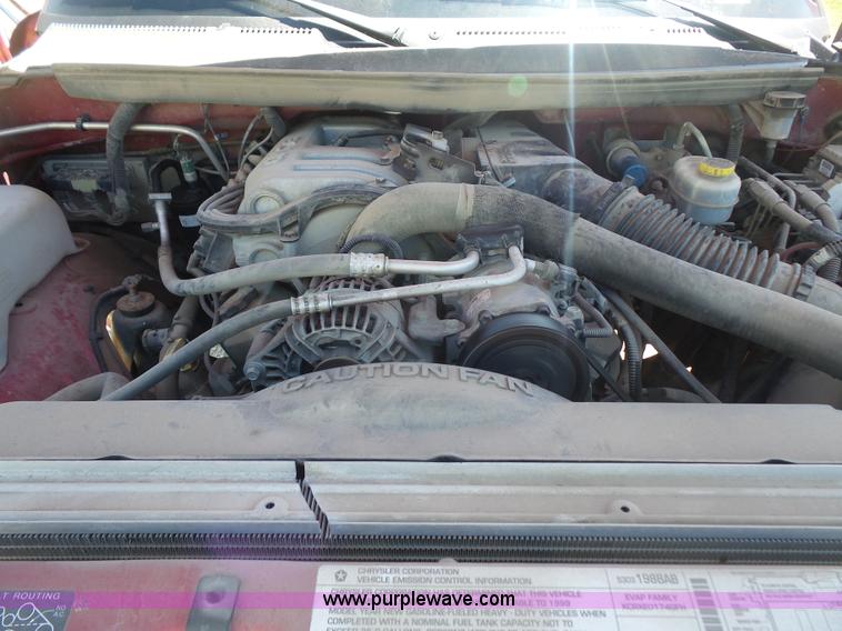 image for item L4838 1999 Dodge Ram 3500 flatbed pickup truck