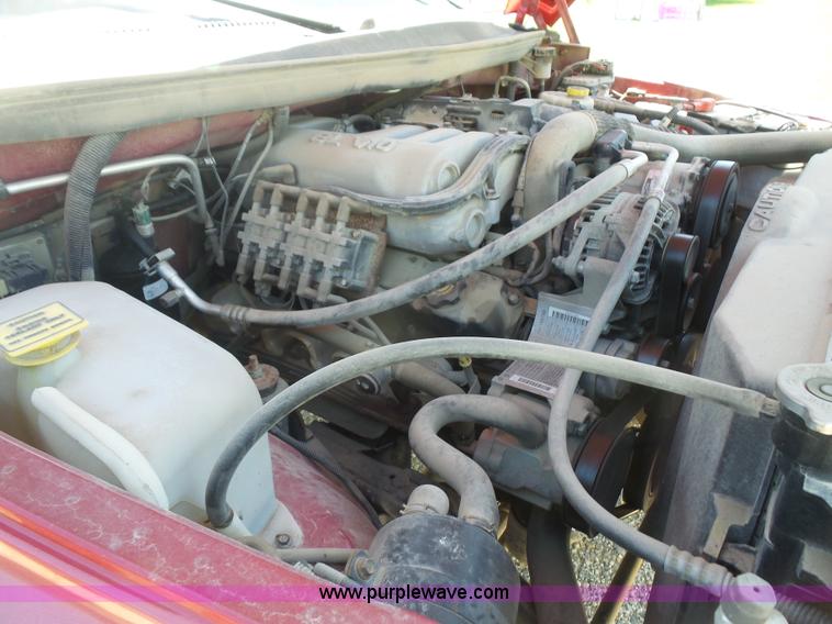 image for item L4838 1999 Dodge Ram 3500 flatbed pickup truck