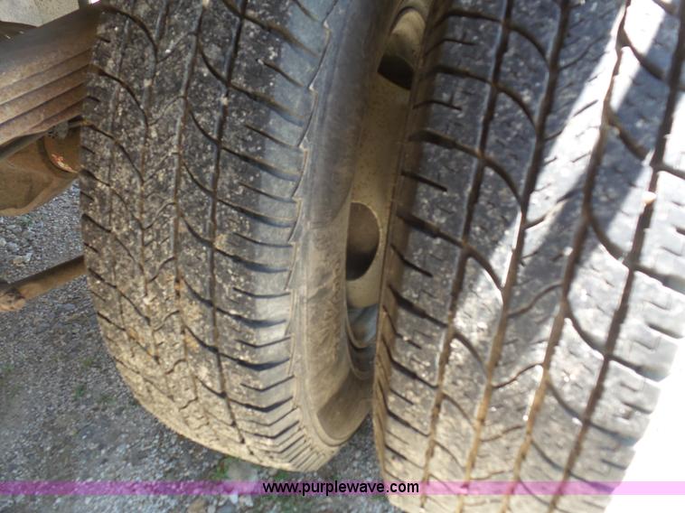 image for item L4838 1999 Dodge Ram 3500 flatbed pickup truck