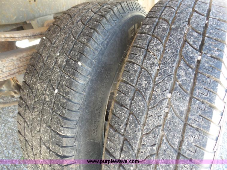 image for item L4838 1999 Dodge Ram 3500 flatbed pickup truck