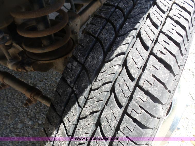 image for item L4838 1999 Dodge Ram 3500 flatbed pickup truck