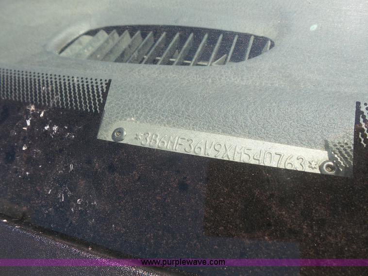 image for item L4838 1999 Dodge Ram 3500 flatbed pickup truck