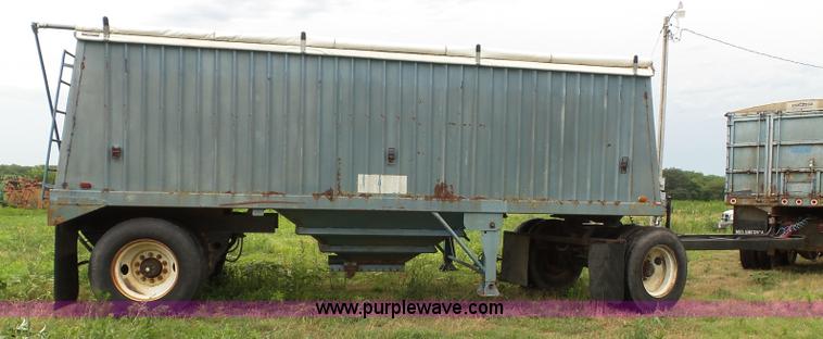 image for item J4841 1991 DMF single hopper grain trailer with dolly