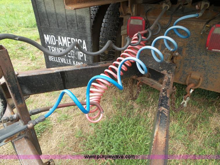 image for item J4841 1991 DMF single hopper grain trailer with dolly