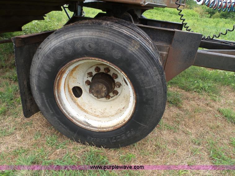 image for item J4841 1991 DMF single hopper grain trailer with dolly
