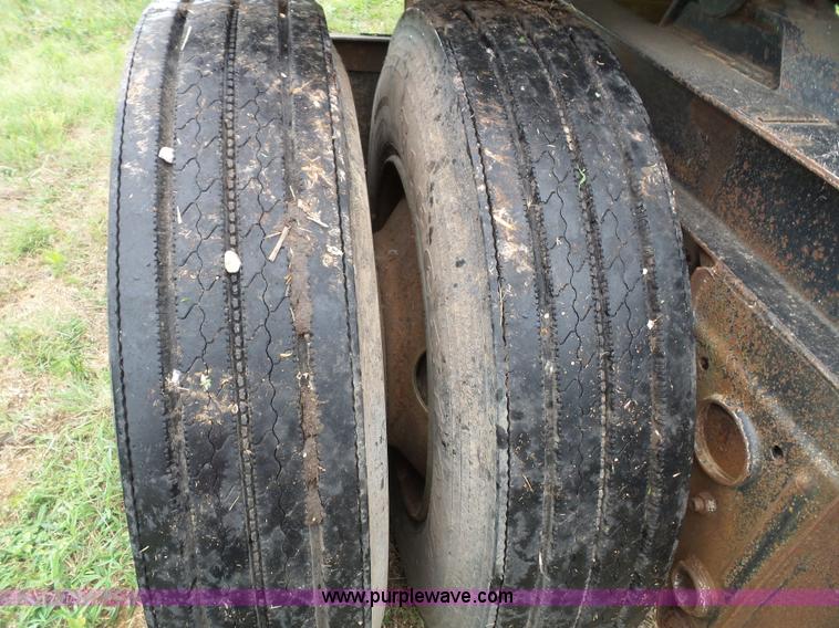 image for item J4841 1991 DMF single hopper grain trailer with dolly