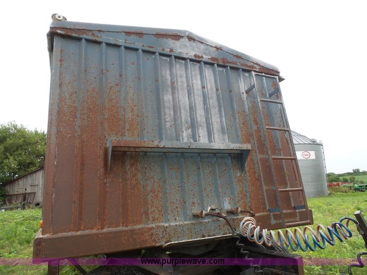 image for item J4841 1991 DMF single hopper grain trailer with dolly