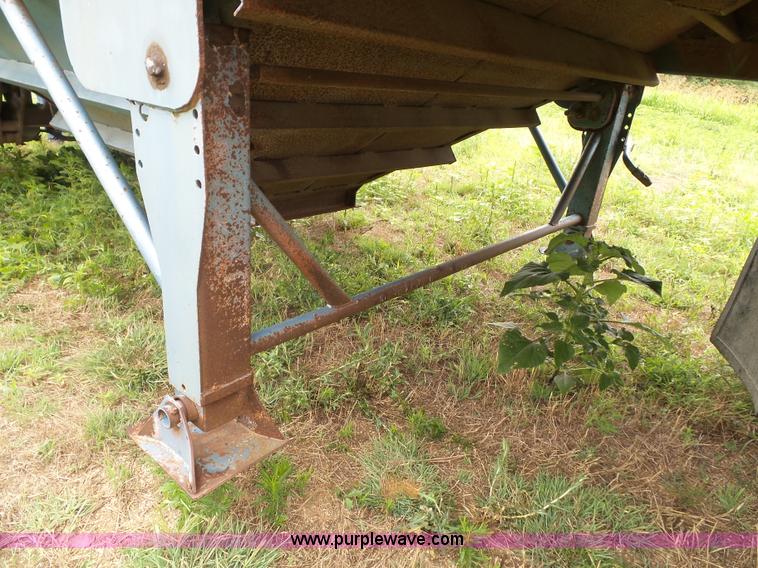 image for item J4841 1991 DMF single hopper grain trailer with dolly