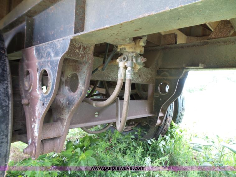image for item J4841 1991 DMF single hopper grain trailer with dolly