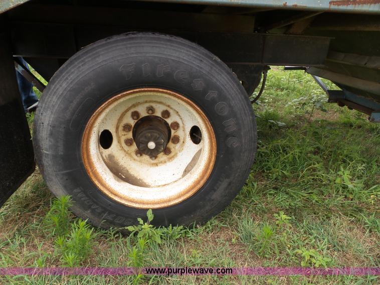 image for item J4841 1991 DMF single hopper grain trailer with dolly