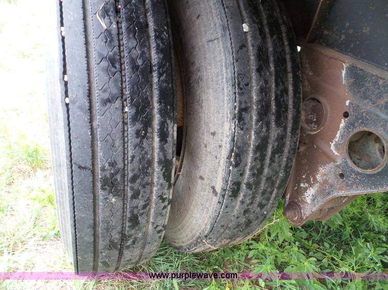 image for item J4841 1991 DMF single hopper grain trailer with dolly