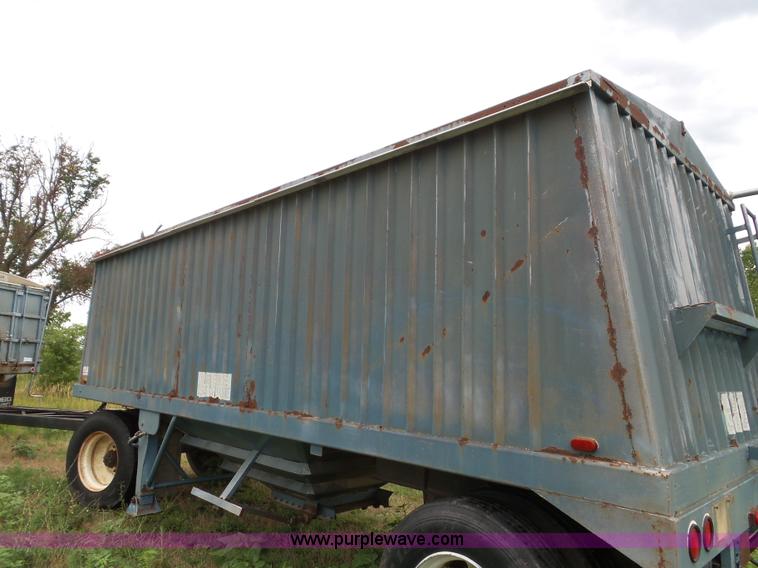 image for item J4841 1991 DMF single hopper grain trailer with dolly