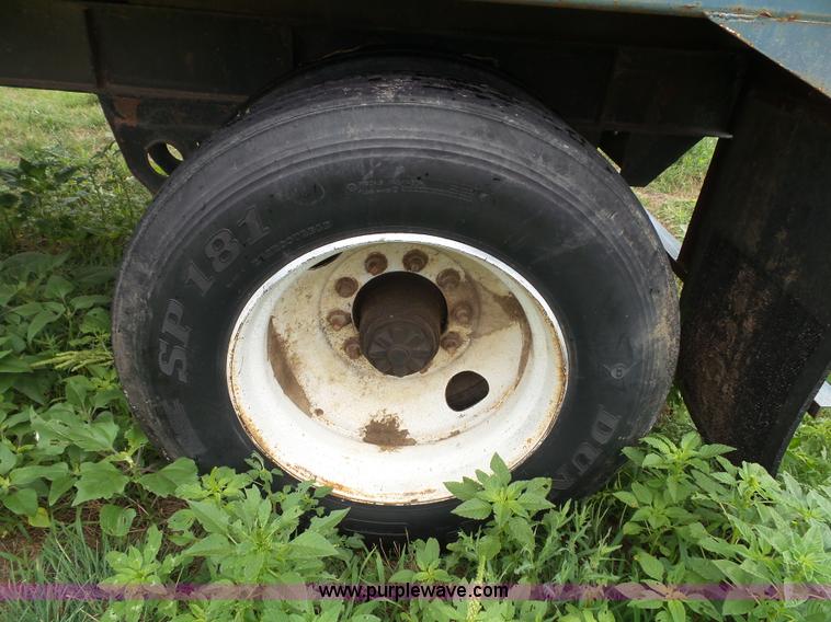 image for item J4841 1991 DMF single hopper grain trailer with dolly