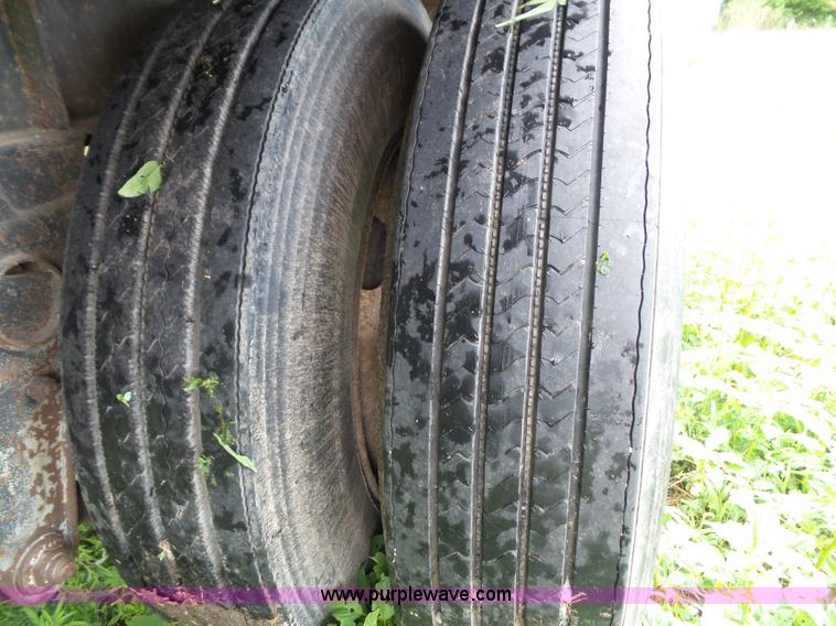 image for item J4841 1991 DMF single hopper grain trailer with dolly