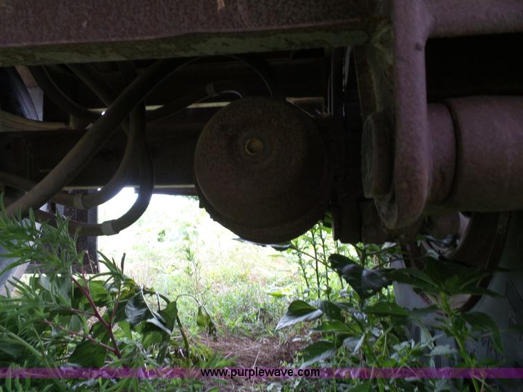 image for item J4841 1991 DMF single hopper grain trailer with dolly