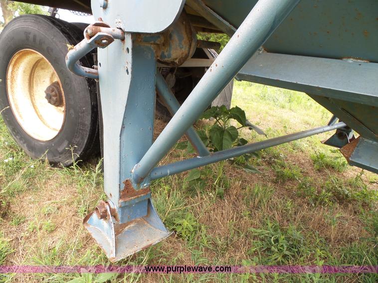 image for item J4841 1991 DMF single hopper grain trailer with dolly