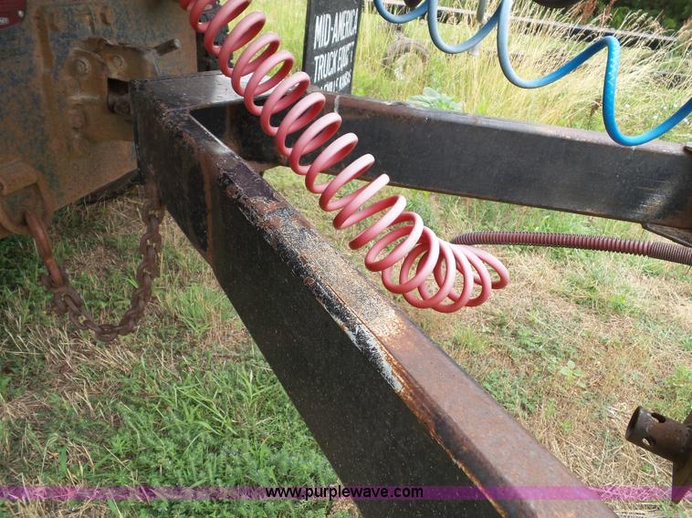 image for item J4841 1991 DMF single hopper grain trailer with dolly