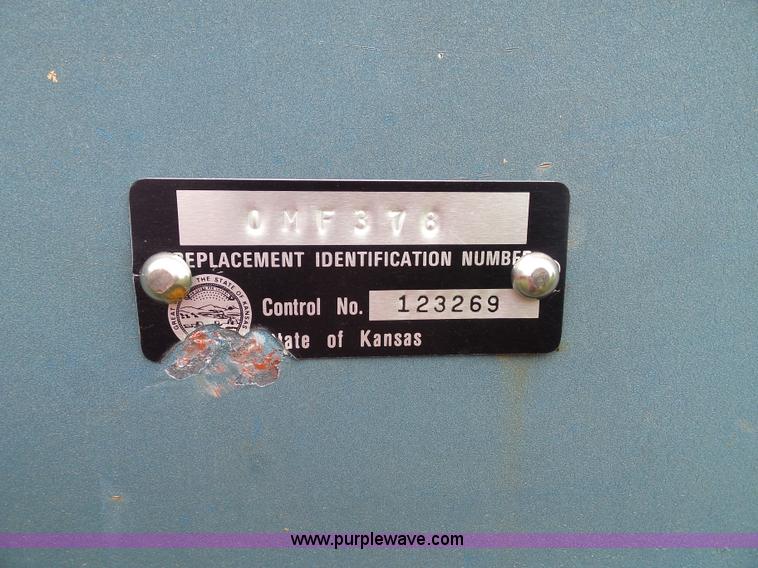 image for item J4841 1991 DMF single hopper grain trailer with dolly