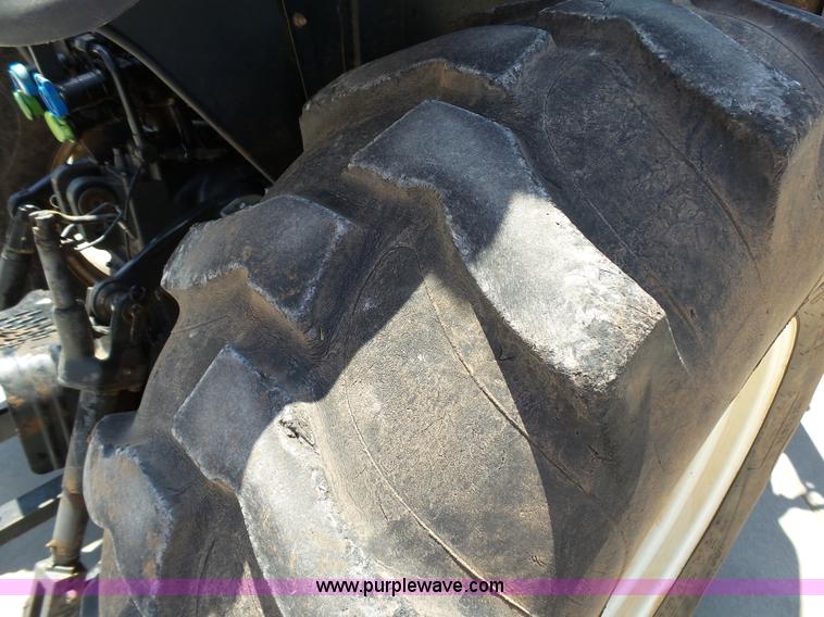 image for item K8764 2012 New Holland T4030 Deluxe MFWD tractor