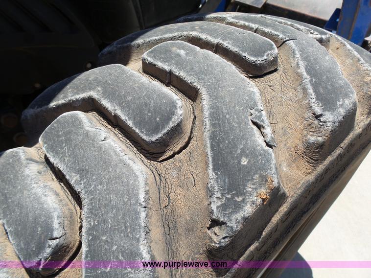 image for item K8764 2012 New Holland T4030 Deluxe MFWD tractor