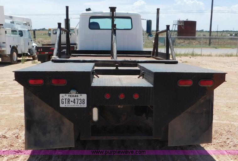 image for item L5916 2001 International 4900 flatbed truck