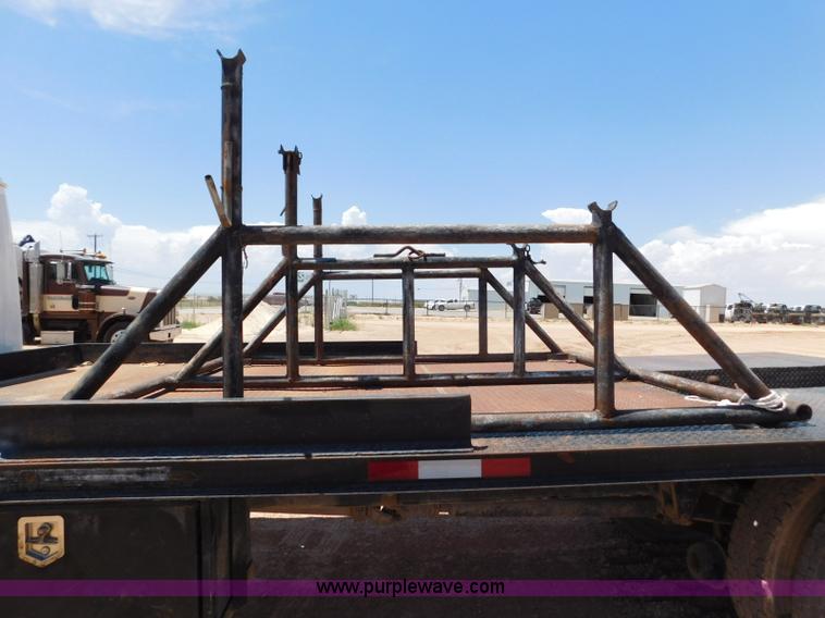 image for item L5916 2001 International 4900 flatbed truck