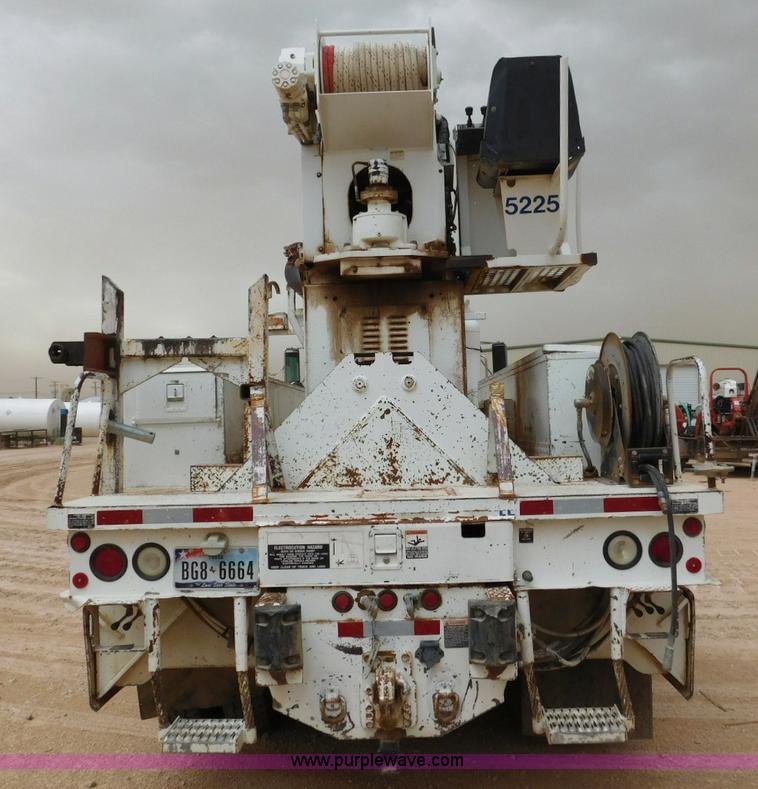 image for item L5932 2001 Peterbilt 330 digger derrick truck