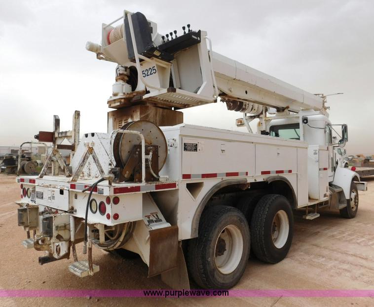 image for item L5932 2001 Peterbilt 330 digger derrick truck