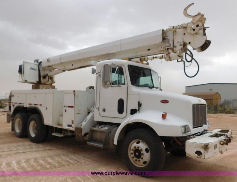 image for item L5932 2001 Peterbilt 330 digger derrick truck