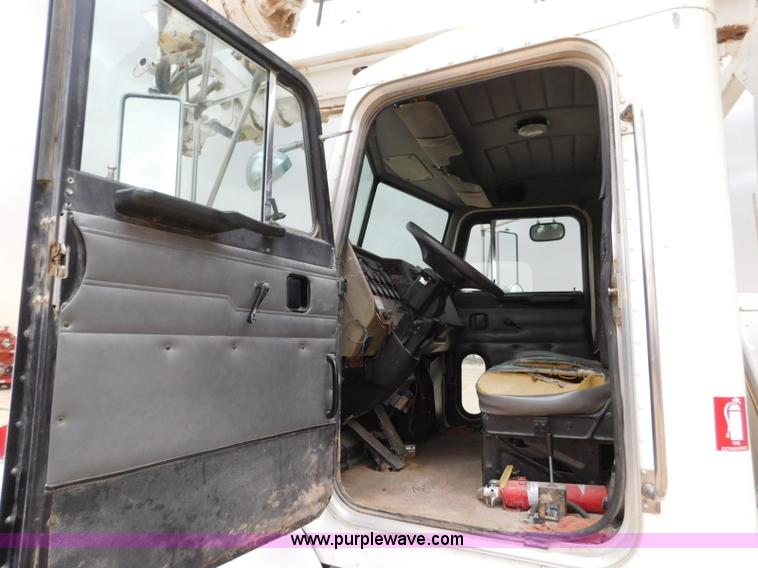 image for item L5932 2001 Peterbilt 330 digger derrick truck