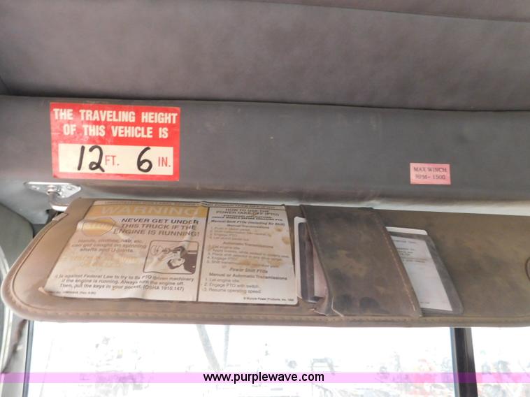 image for item L5932 2001 Peterbilt 330 digger derrick truck